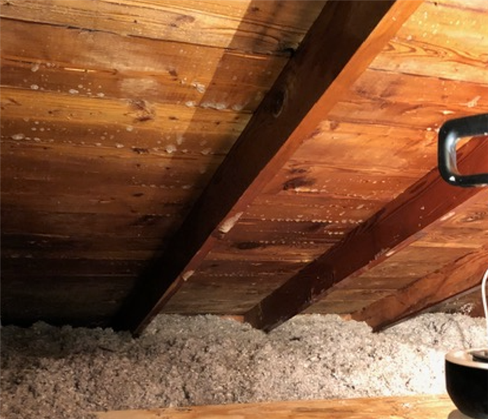 an attic with clean wood planks